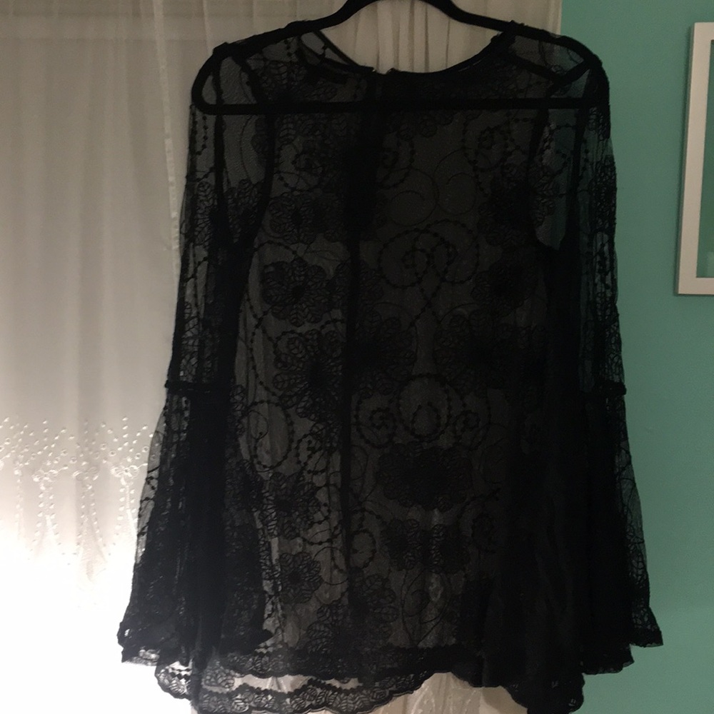 Gorgeous lace top with bell sleeve detail
